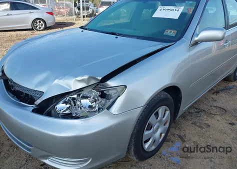2002 Toyota Camry Le z USA, uszkodzony, nr VIN 4T1BE32K52U527663